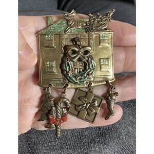1980’s Christmas-themed House Brooch with dangling charms
